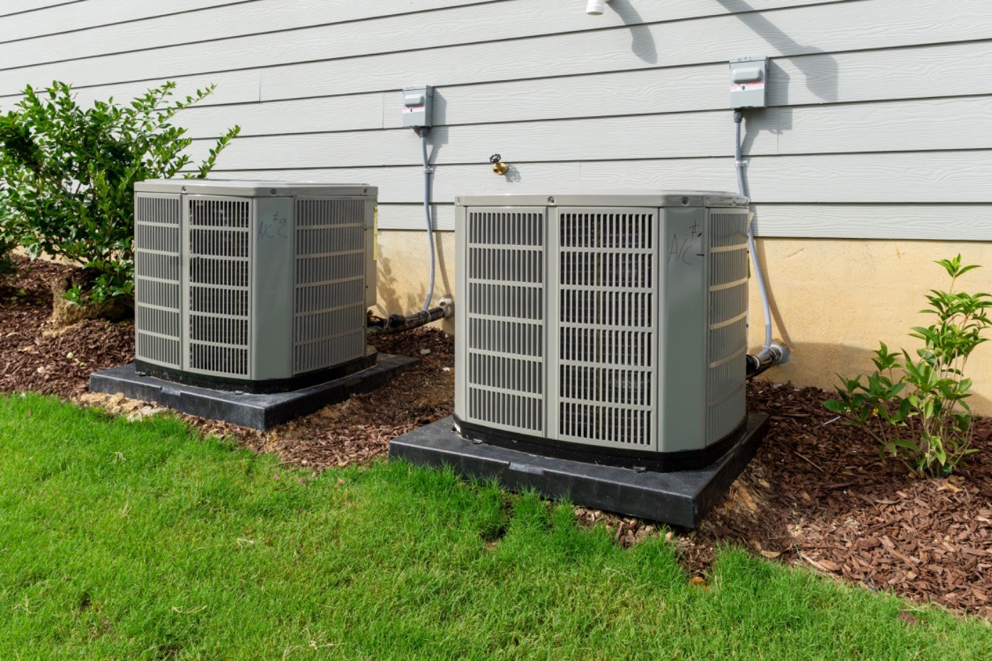 Residential air conditioning condenser units serviced by Hixon near Suwanee, GA